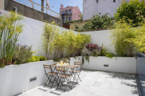 Bright apt with patio in city center!